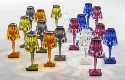 Portable cordless diamond-cut crystal night light for modern bedroom decor.