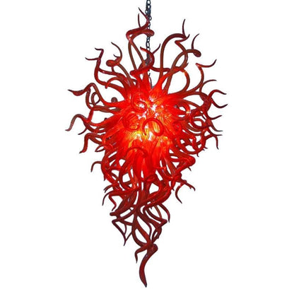 Large asymmetrical red blown glass chandelier with flame-like tendrils in a vertical teardrop silhouette on a white background.