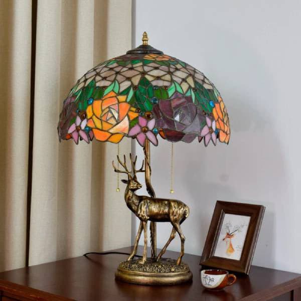 warm light 1990s style tiffany bedside table lamps.jpg