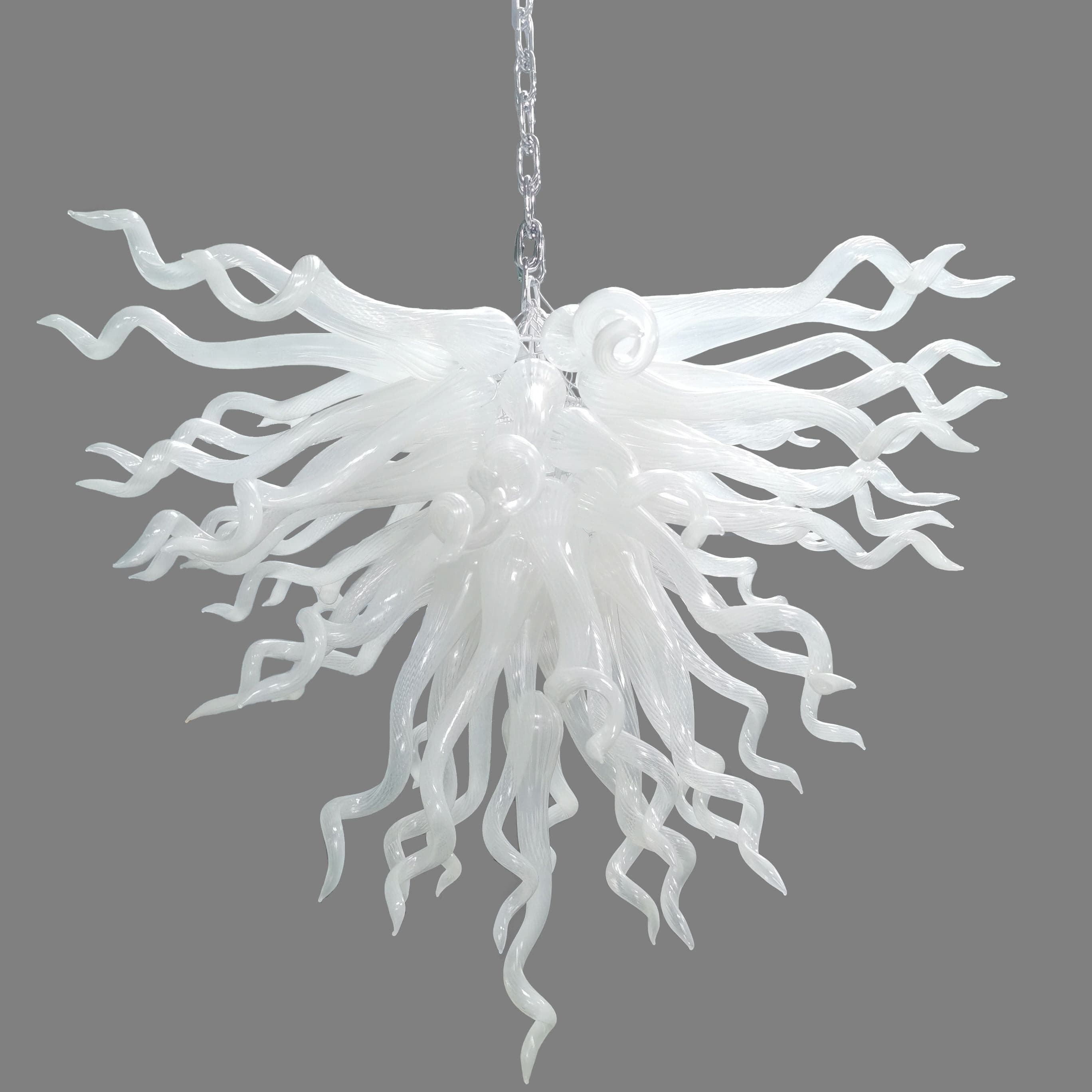 Serene Waterfall artisan glass chandelier featuring a dense cluster of hand-blown white glass spirals hanging from a metal chain