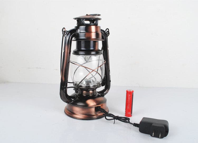 Traditional bronze rechargeable lantern with clear glass globe and LED bulb.