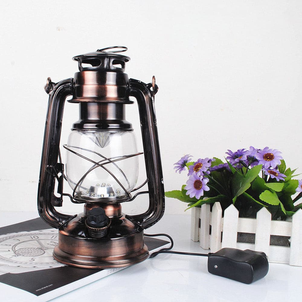 Antique copper vintage LED horse lantern with rechargeable battery and charging cable.