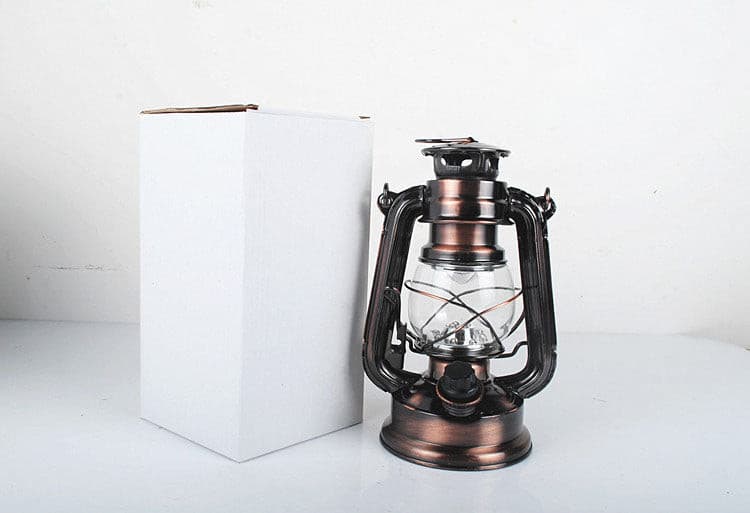 Vintage LED horse lantern with its protective white packaging box for safe shipping.