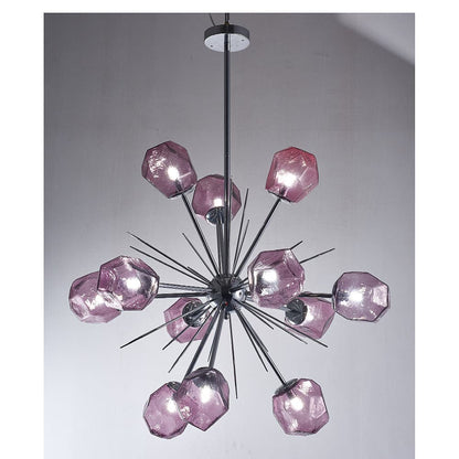 Midnight Amethyst chandelier illuminated in a contemporary setting, highlighting the warm purple glow and metallic reflections