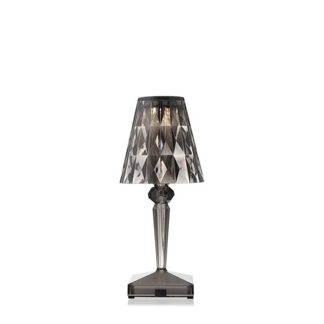 Modern smoky grey acrylic crystal bedside lamp with diamond-cut lampshade.