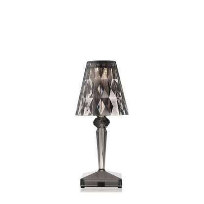 Modern smoky grey acrylic crystal bedside lamp with diamond-cut lampshade.