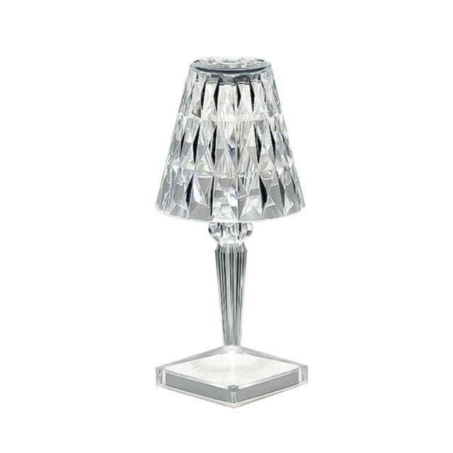 Contemporary clear crystal-style acrylic table lamp for elegant bedroom decor.